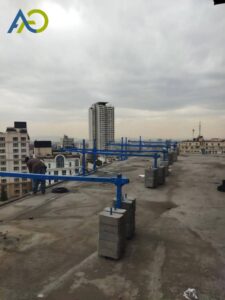 نحوه چیدمان صحیح وزنه‌های تعادل چدنی روی سازه نگهدارنده کلایمر در پشت بام